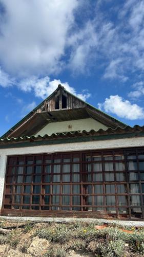 a building with a lot of windows on it at Angelita in Aguas Dulces