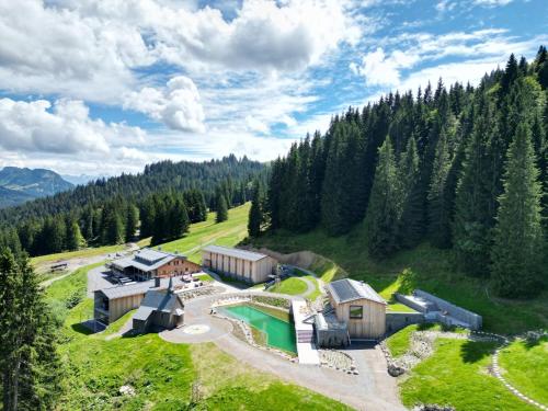 an aerial view of a resort in the mountains at Köpfle Alpe in Balderschwang