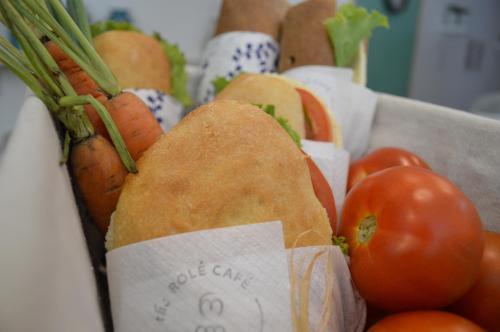 a box filled with carrots and tomatoes at The Rolé House in Gurjaani