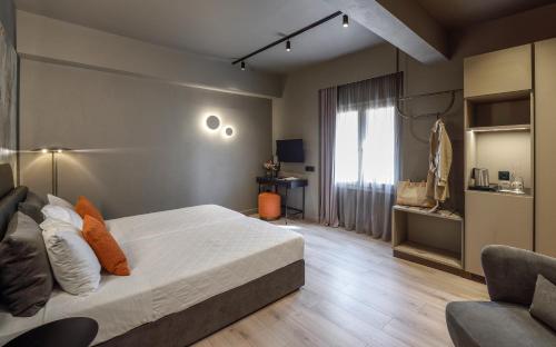 Katil atau katil-katil dalam bilik di Arcadion Hotel
