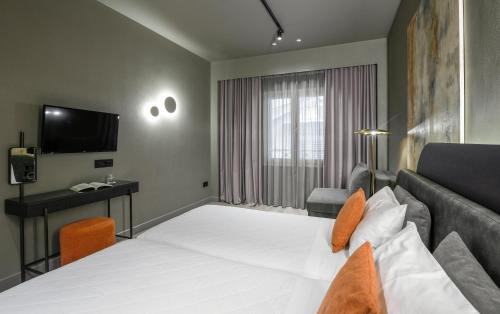 Televisyen dan/atau pusat hiburan di Arcadion Hotel