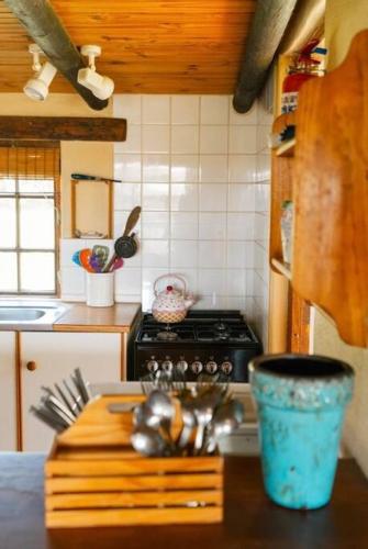 Una cocina o zona de cocina en Rivertime