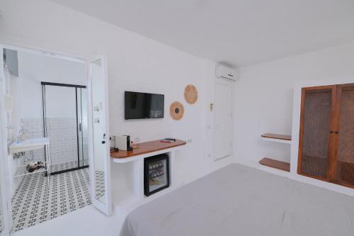 TV a/nebo společenská místnost v ubytování Peremere Alacati Otel