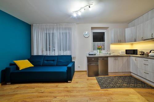 Kuchyň nebo kuchyňský kout v ubytování Apartamenty KOMBI