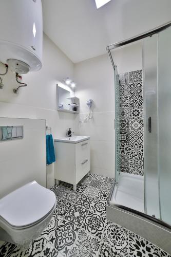Koupelna v ubytování Apartamenty KOMBI
