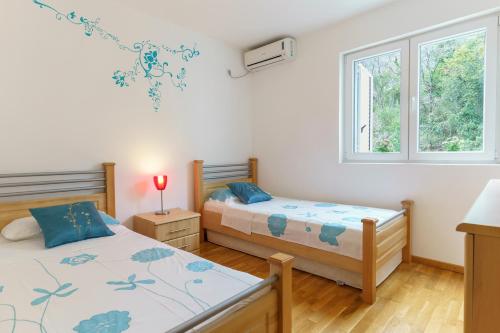 Cama o camas de una habitación en Sea view apartment in Kotor Bay
