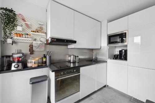 Ett kök eller pentry på Aréna La Défense - Appt 75m² pour 6 voyageurs