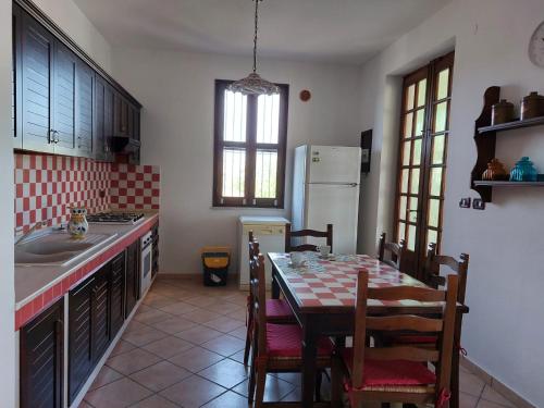 Kuchyň nebo kuchyňský kout v ubytování Villa Gabriella