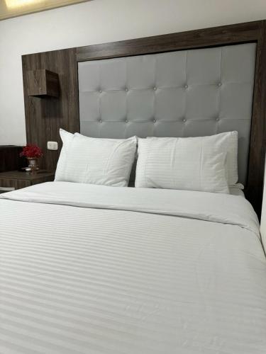 Postel nebo postele na pokoji v ubytování Hotel Juan Pablo 2