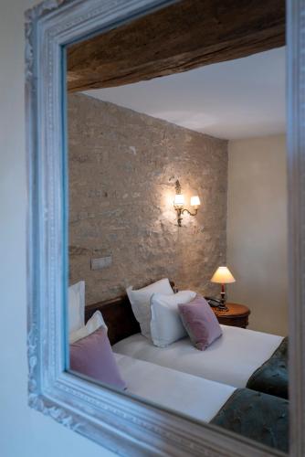 Katil atau katil-katil dalam bilik di Hôtel Le Clos