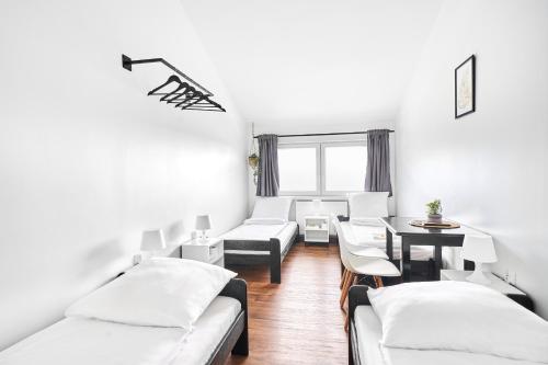 Ένα ή περισσότερα κρεβάτια σε δωμάτιο στο Hostel L44