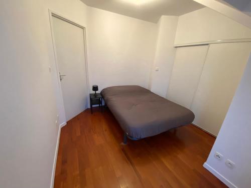 Cama o camas de una habitación en Superbe Appartement centre Sautron