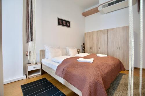 Posteľ alebo postele v izbe v ubytovaní Premium Apartment by Hi5 - Vitkovics Suite