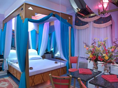 Katil atau katil-katil dalam bilik di Xangai Motel by Drops