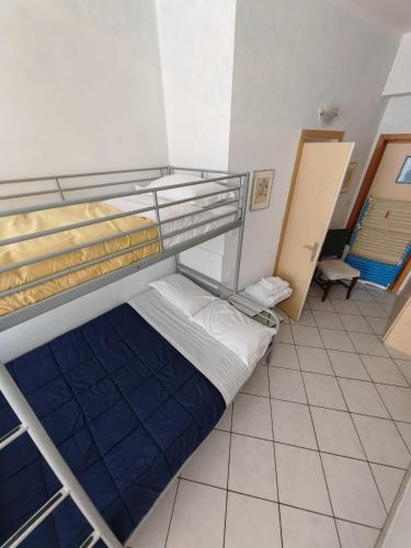 Katil atau katil-katil dalam bilik di Garda Apartments in Euroresidence