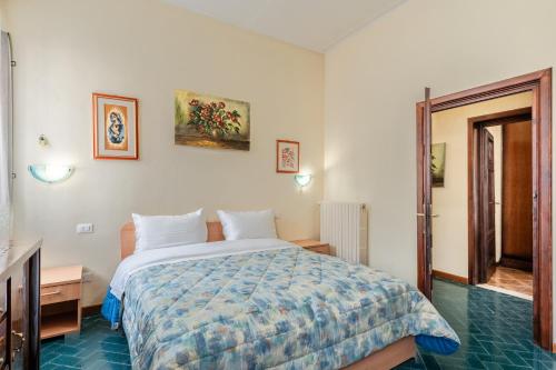 Postel nebo postele na pokoji v ubytování Bellavista Altopascio