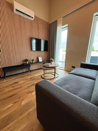 Télévision ou salle de divertissement dans l'établissement Hotel Mezza Notte