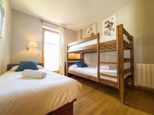 Двухъярусная кровать или двухъярусные кровати в номере Green Valley Puigcerdà
