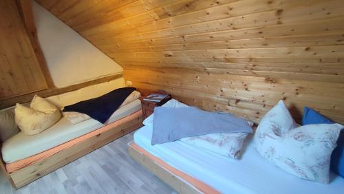 Postel nebo postele na pokoji v ubytování Hainich-Zeit