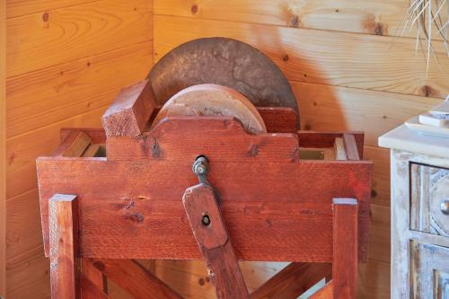 a wooden box with a metal object in a room at Montargil Lakeside Bliss, by TimeCooler in Montargil
