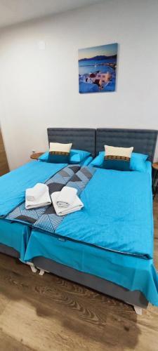 Apartmani Toki Balkanaにあるベッド