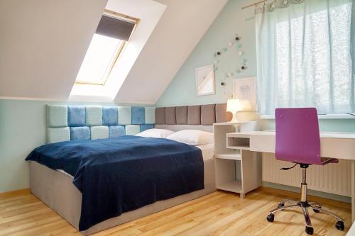 Postelja oz. postelje v sobi nastanitve Villa Słoneczna 6 by Baltic Home