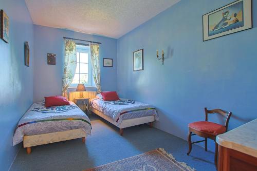 Ένα ή περισσότερα κρεβάτια σε δωμάτιο στο Domaine la Roblinière 10min plage