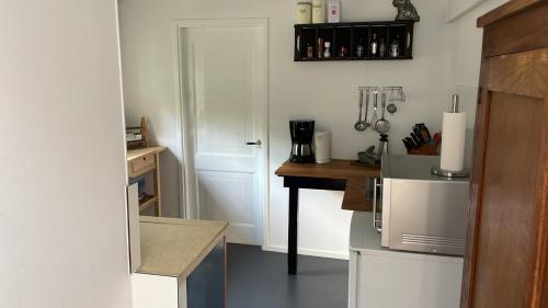 Kuchyň nebo kuchyňský kout v ubytování Texel lodge