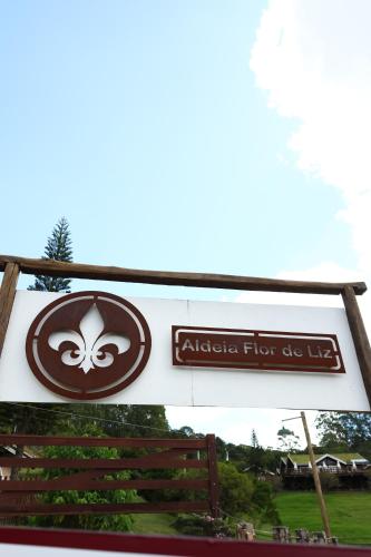 a sign for an antelope florence fire department at Aldeia Flor de Liz - Pedra Azul in Pedra Azul