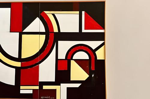 a painting of a door with the word eq at Luxo à beira-mar no Solar Tambaú in João Pessoa