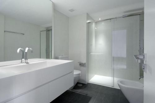 a bathroom with a sink and a toilet and a shower at Rooms & Apartments near Zoologischer Garten in Berlin