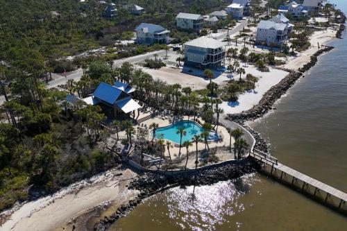 an aerial view of a resort next to the water at Windmark - Sunset by the Bay in Highland View