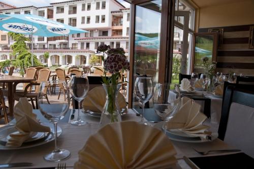 Restoranas ar kita vieta pavalgyti apgyvendinimo įstaigoje Apart Hotel Harmony Hills Residence