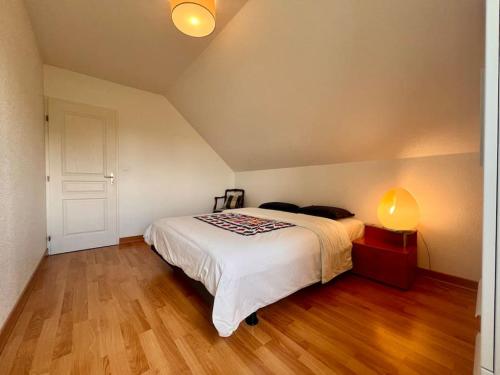 Voodi või voodid majutusasutuse Maison 6 prsn / Jardin & Double Garage / Gare TGV toas