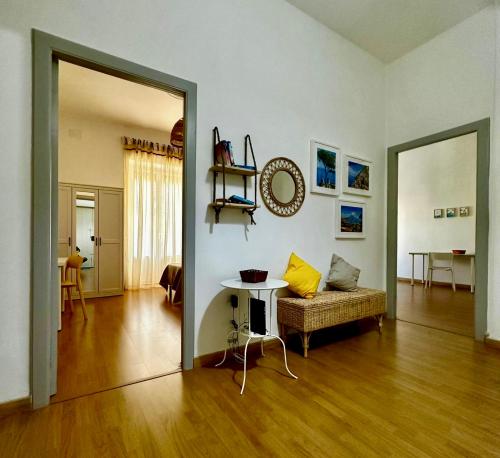 a living room with a couch and a table at Casa Lamar in Salerno