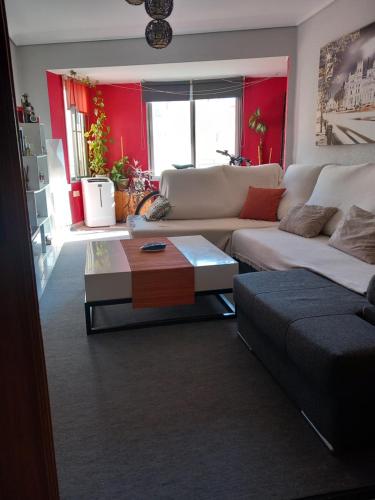 a living room with a couch and a coffee table at Castellón in Castellón de la Plana