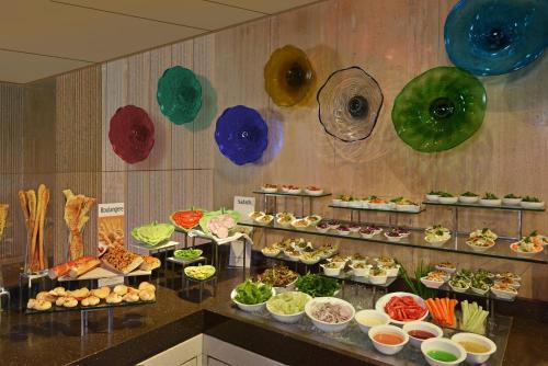 a buffet with many different types of food on display at Fortune Park, Ahmedabad - Member ITC Hotels' Group in Ahmedabad