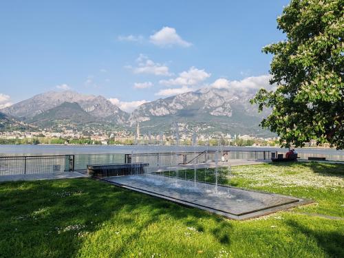 a view of a body of water with mountains at Silla House - A due passi dal lago in Malgrate