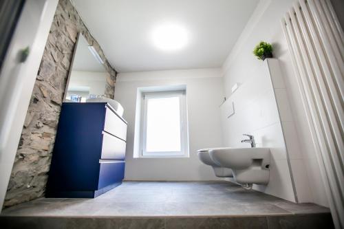 a bathroom with a sink and a sink at Casa di Bruno in Pellio Superiore