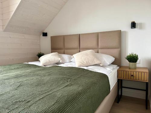 Postel nebo postele na pokoji v ubytování House Natura