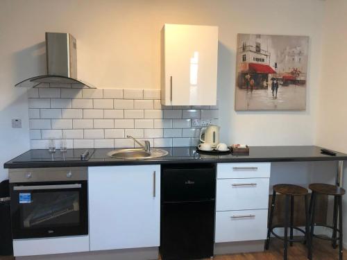 A kitchen or kitchenette at Studio in Bolton town, Short stay studio 5,