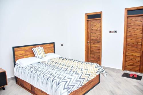 Postel nebo postele na pokoji v ubytování Mwambani Beach Villas (Tanga)