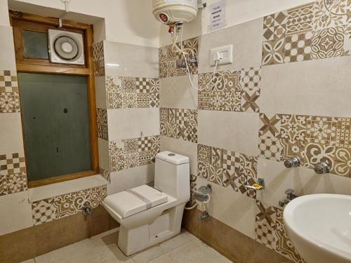 Kylpyhuone majoituspaikassa The Kuber Vatika