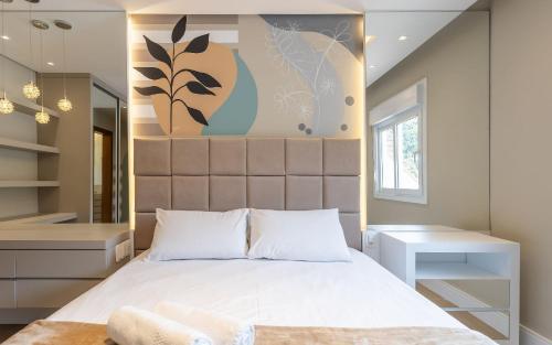 Un pat sau paturi într-o cameră la LOCAR-IN GRAMADO- Maria Antonia