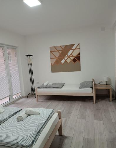 Cama o camas de una habitación en Sunčani apartman 1