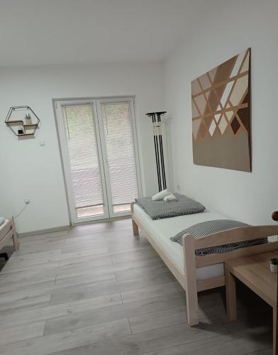 Cama o camas de una habitación en Sunčani apartman 1