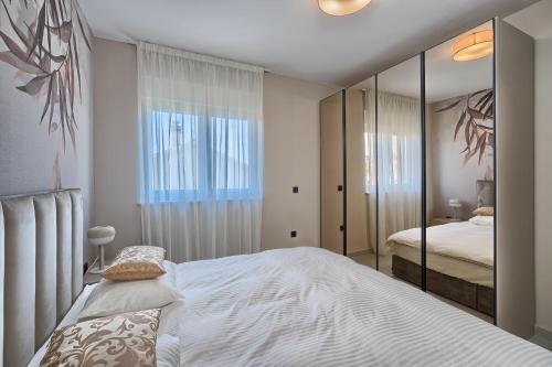Postel nebo postele na pokoji v ubytování Residence Franc 1