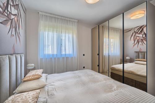 Postel nebo postele na pokoji v ubytování Residence Franc 1