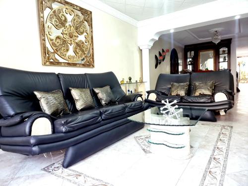 Zona de estar de Habitación amplia y cómoda con baño privado