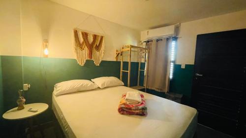 Ένα ή περισσότερα κρεβάτια σε δωμάτιο στο Sunflower Hostel